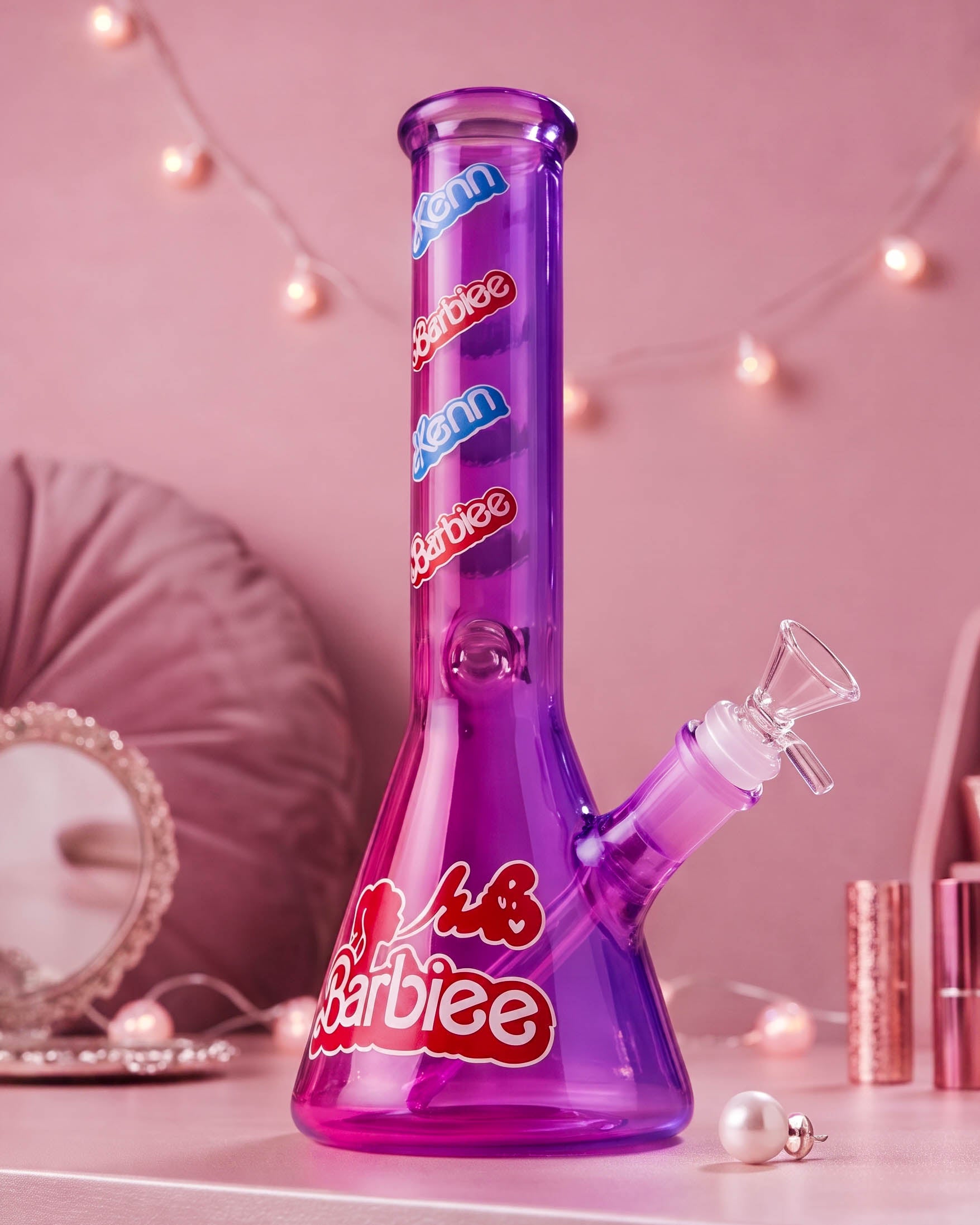 Purple 10-inch beaker bong with colorful fashion-doll-inspired graphics, wide glass base, angled downstem, and clear 14mm bowl.