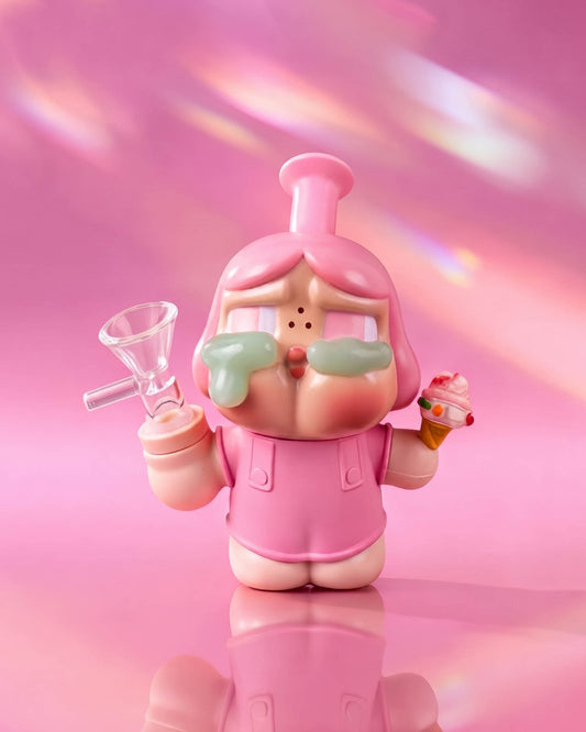 Pink 4.5-inch crybaby character silicone bong with pastel details, ice cream accessory, and removable 14mm glass bowl.