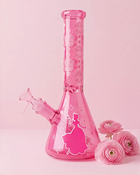 Pink 10-inch Princess Puff beaker bong with crown graphics, princess silhouette, butterfly details, angled downstem, and removable 14mm glass bowl.