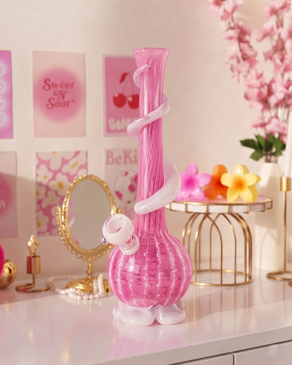 Pink 12-inch vase bong with white ribbon accents, swirled glass body, sculpted base, and removable 14mm glass bowl.